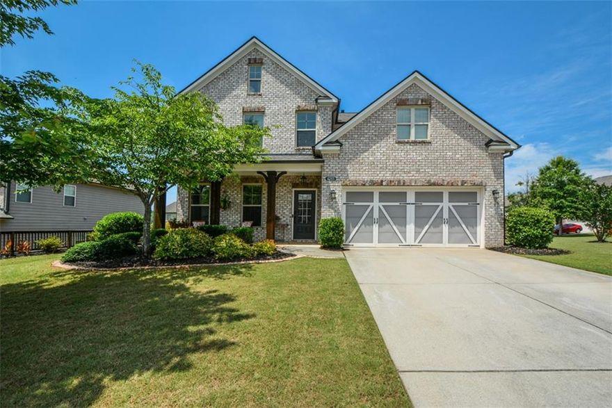 Beautiful open concept living in a gated West Forsyth swim/tennis community. Sought after master on the main and gorgeous master bathroom. Hardwood floors throughout, and an updated kitchen with new refrigerator, dishwasher, and oversized island with a perfect view of the living room stacked stone fireplace. Spacious separate dining room. Relaxing covered patio overlooks large, fenced, flat backyard....great for kids, pets and entertaining. Upstairs includes a spacious loft, 3 bedrooms, 2 full baths, and additional storage. Brand new flooring, new roof, and fresh paint. Enjoy the friendly neighborhood from the covered front porch, back porch pergola, or the large, flat corner lot! Gorgeous home in a highly rated school district. Shows like a model!