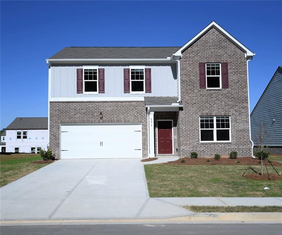 Welcome to the charming town of Loganville. This exquisite 4-bedroom, 2.5-bath home is sure to capture your heart. Boasting an open floor plan and modern finishes throughout, this residence offers a comfortable and stylish living experience. Step inside and be greeted by the inviting atmosphere of the spacious living area, seamlessly flowing into the kitchen and dining spaces. The well-appointed kitchen is a chef's dream, featuring granite countertops, stainless steel appliances, and a large center island, perfect for meal preparation or casual dining. A walk-in pantry provides ample storage space for all your culinary needs, ensuring a clutter-free and organized kitchen. Entertaining guests or enjoying family meals is a delight in this thoughtfully designed kitchen. The primary suite is a peaceful retreat, offering a tranquil escape from the hustle and bustle of daily life. It features a generously sized closet, providing plenty storage for your wardrobe and accessories. In addition to the primary suite, three more spacious bedrooms offer versatility and comfort for family members or guests. The 2.5 baths ensure convenience for everyone. This residence also boasts a charming outdoor space, perfect for hosting cookouts or simply enjoying the fresh air. With its well-manicured lawn and potential for landscaping, the backyard presents endless possibilities for outdoor recreation and relaxation. Situated in the desirable town of Loganville, this home offers a serene suburban lifestyle while being conveniently located near schools, shopping centers, and other amenities.