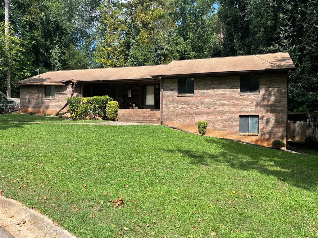 Investor-friendly find in Lithia Springs! 3 bed, 2 bath ranch on an unfinished basement, packed with potential and ready for your touch! Seller signed over the rights of the property via assignment of contract. *SOLD AS-IS* *NO DISCLOSURES* *DO NOT DISTURB THE OCCUPANT* *CASH ONLY* some items in home are staying with the property. If you are interested in the property, contact Justin Duke Directly: 770-765-1674.