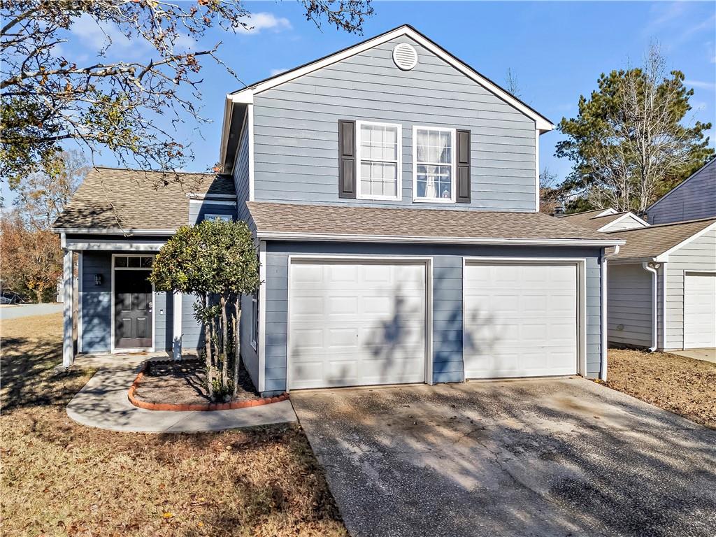 Beautifully updated and light filled home in a welcoming community with fully fenced yard! This move-in-ready gem features a newer roof, newer appliances and stylish lighting fixtures. The kitchen shines with gorgeous porcelain tile floors and tile backsplash. Bathrooms boast newer toilets, while the bedrooms are enhanced with newer ceiling fans. Step outside to enjoy dusk-to-dawn lights that illuminate both the front and back of the house. The spacious master suite offers a walk-in closet and an en suite bathroom complete with soaking tub and separate shower. Situated on a large corner lot, this home is filled with natural light and is perfectly located near shopping and major highways.