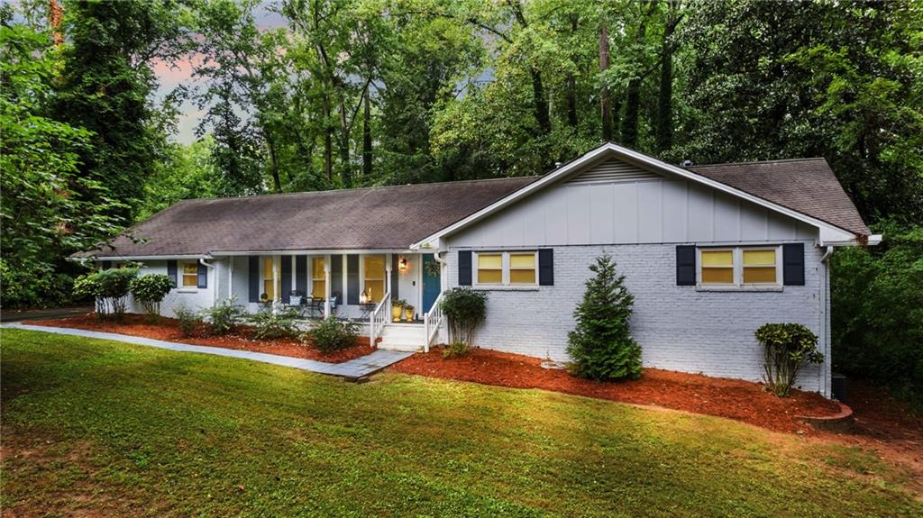 Welcome to your beautifully renovated 4-bedroom, 3 full bathroom brick ranch located just a short walk from the heart of downtown Alpharetta. This home blends modern updates with classic charm, featuring an open floor plan filled with natural light and gorgeous hardwood floors. The updated kitchen and bathrooms offer sleek, stylish finishes, while the spacious layout provides both comfort and functionality for everyday living. Situated on a quiet cul-de-sac, this home also boasts a private backyard—perfect for relaxing evenings, entertaining friends, or enjoying time outdoors. You'll love the peaceful setting while still being just minutes from Alpharetta’s vibrant shopping, dining, and entertainment options. With no HOA and move-in-ready condition, this is a rare opportunity to rent in one of the most desirable areas in Alpharetta.