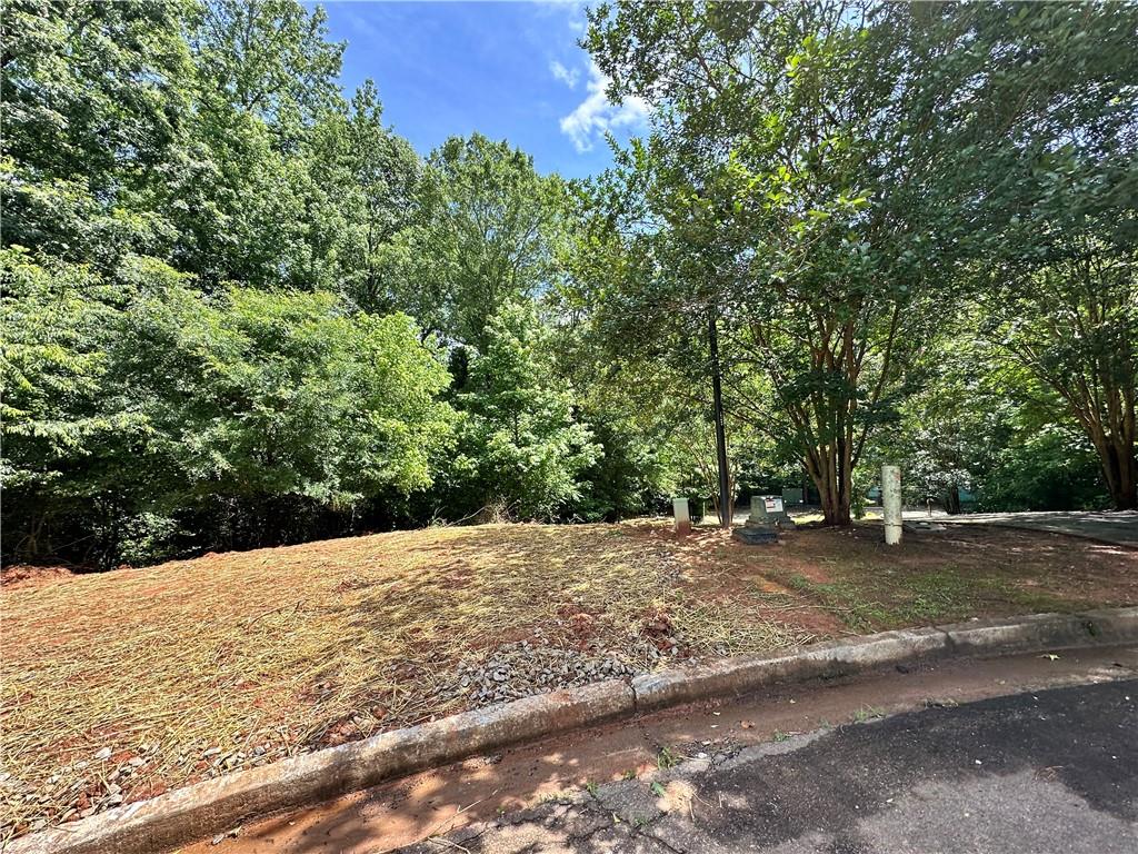 Highly desired Traditions of Braselton Golf Community * Resort Style amenities including Olympic size zero entry Pool * Waterslides * Basketball Courts * Playground * Golf Course * Tennis Courts * Pickleball Courts *Walking Trails * Fitness Center *Sidewalks * One of the Largest Lot left for Sale * Bring your own builder * Close to Shopping * Award Winning Schools * Great Opportunity. Large 2.78 acres * Cul-De-Sac lot * Basement Lot * Floor Plan Included with Purchase * Water Meter Installed * Conveniently located to Publix * Shops * Restaurants * I85 * Floor Plan was approved by ARB *