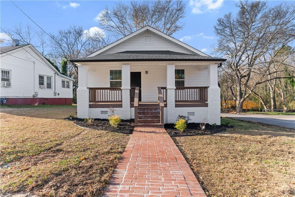 Investment Opportunity! Fully renovated 2-bedroom, 1-bath home just minutes from downtown Rome, schools, parks, and the river. This open-concept home features granite countertops, stainless steel appliances, walk-in closets, and new flooring throughout. Recent upgrades include newer roof, HVAC, windows, and insulation for energy efficiency. Rocking chair front porch with brick pathway. Currently tenant occupied, professionally managed, and leased for immediate income.