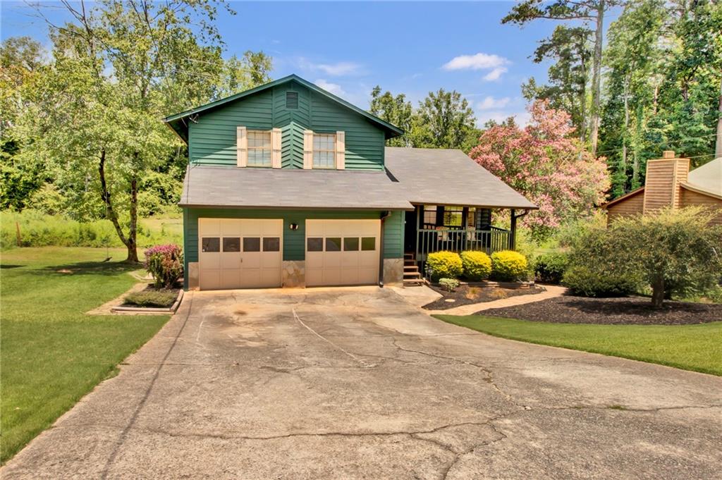 Discover the perfect blend of modern comfort, convenience, and affordability in this beautifully maintained 3-bedroom, 2-bathroom home, offering 1,450 square feet of open-concept living. Tucked away in the tranquil and neighborly Pony Run community, this gem delivers the best of both worlds: peaceful suburban living with quick 10 minute access to the vibrant heart of Downtown Duluth and Old Norcross. Zoned for the top-rated Paul Duke STEM High School, this home is a smart choice for families prioritizing education. With easy access to I-85 and Buford Highway, you're just 20 minutes from Brookhaven, Buckhead, Chamblee, Peachtree Corners, Johns Creek, CDC/Emory University, and the new Arthur M. Blank Children's Hospital. Step inside to a home designed for comfort and style. Enjoy a modern kitchen complete with stone countertops and a sleek tiled backsplash, updated bathrooms, fresh flooring, and carpeting throughout. A cozy fireplace anchors the living area, while a spacious deck and level backyard-which flows into an expansive greenbelt-offers the perfect backdrop for outdoor entertaining or quiet relaxation. Move in with peace of mind: new HVAC system, Gas hot water service and kitchen, fresh interior and exterior paint, and a durable, well-maintained roof ensure a truly turn-key experience. In today's market, finding a home that's more affordable than renting while offering this level of quality and location is rare. This property represents an exceptional opportunity to build equity instead of paying someone else's mortgage, all while living in one of Duluth's most desirable areas. Schedule your private tour today and start your next chapter in this exceptional home.