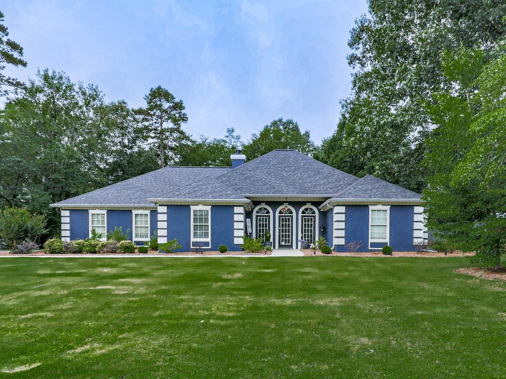 Charming 4-Bedroom Ranch with Pool on a Beautiful Level Lot in Rome, GA!
Welcome to this beautifully maintained one-level ranch-style home offering comfort, space, and functionality on a gorgeous level lot in an established neighborhood. Boasting 2,386 sq. ft., this 4-bedroom, 2-bath home is move-in ready with thoughtful updates and stunning features throughout!
Step into the spacious family room, where vaulted ceilings, a cozy fireplace, and an abundance of natural light create a warm and inviting atmosphere. The formal dining room flows into a large white kitchen complete with ample cabinetry, newer appliances, and plenty of counter space—ideal for both everyday living and entertaining.
The huge master suite is a true retreat, featuring vaulted ceilings, a luxurious jetted tub, separate shower, and an expansive walk-in closet. On the opposite side of the home, you'll find three generously sized bedrooms and a full bathroom—perfect for family or guests.
Enjoy year-round relaxation in the enclosed sunroom, which overlooks a private, fenced backyard complete with a sparkling 18x36 lap-size inground pool—perfect for summer fun! A large outbuilding with workshop and power flooring adds excellent storage or hobby space, and the two-car garage provides additional convenience.
Notable upgrades include Brand new roof (2023) Septic system pumped and new field lines (2022) Exterior stucco freshly painted (2024) Interior repainted, new fixtures, and LVP flooring installed (approx. 5 years ago) Two hot water heaters
Optional swim/tennis HOA membership available—not mandatory!
Located just minutes from shopping, restaurants, and easy access to Highway 411, this home offers the perfect combination of peace, privacy, and accessibility. Whether you're upsizing, downsizing, or seeking your forever home—this one has it all.
Schedule your private showing today—this gem won’t last long!