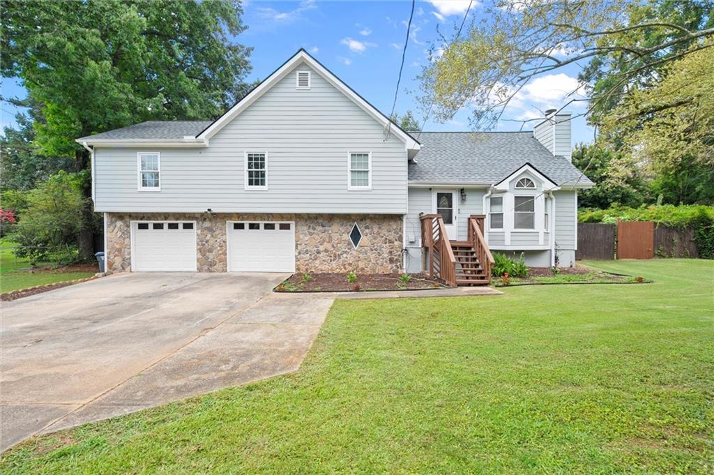 Freshly renovated property in Suwanee 30024! This house comes with new water heater, new hardwood floors on main level, stairs and upstairs landing. New kitchen cabinets with soft-close features, New Quartz countertops, New backsplash, New stainless steel appliances, New flooring on main, New carpet upstairs, New vanities, new locks, new lights, new paint, and the lists go on. Plus, the house has been professionally landscaped and it is a on a flat lot. Roof replaced Dec 2024. You will enjoy the custom designed kitchen with plenty of cabinets, kitchen island. The sun room has newly installed cabinets and sink. Also check out the custom made master closets. Do not miss this house!