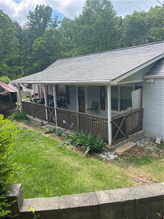 Attention Investors or Fix n Flip Enthusiast!!! This home is in a great location sitting in 2.16 acres near the Paulding County Airport, private but conveniently located and a short drive to shopping and restaurants. The roof was replaced in 2019 and the house has tons of potential! With a little imagination and some TLC, it would be a great investment for a flip and/or renovation and is being sold “as is”. I