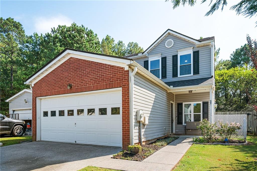Incredible opportunity for a 4 bedroom townhome with the primary bedroom on main, on a cul-de-sac, with a large fenced yard, AND new windows, AND a new roof, AND, AND, AND! Step inside after a long day's work and flop on your couch in your two story living room which showcases a fireplace and open staircase. Too tired for stairs? The primary bedroom and bath are on the main level! Upstairs, you'll find three spacious bedrooms and one full bathroom. Grill dinner, toss a ball to your pup, or simply watch your birdfeeder in your private and fenced backyard. So rare to find a four bedroom townhome in this area! Sellers have invested in big projects to make this a solid home. 2025 Projects - New Roof, New Windows 2024 Projects - New AC unit, All kitchen appliances Replaced! New Insulation in attic, Kitchen sink Replaced!, All bathroom sinks and toilets Replaced! All kitchen appliances stay with the home! Excellent Community!