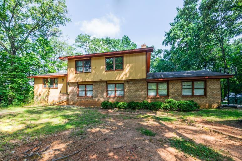 HUGE PRICE REDUCTION!! Investors dream! Great fixer upper on 2.10 beautiful acres in the sought after town of Ball Ground! Sold "as is". 3 bedrooms, 2 baths on the upper level, plus 2 bedrooms, 2nd kitchen, den & 1 full bath on the lower basement level. LVP flooring throughout the main level. Minutes to the quaint town of Ball Ground, shopping & schools! Minutes to Hwy 575, downtown Canton & Northside Cherokee Hospital! Great location!! Will not qualify for FHA, VA, or Conventional loans. Rehab, construction permanent loan or cash! Seller has a current appraisal. Priced well below the appraised value.