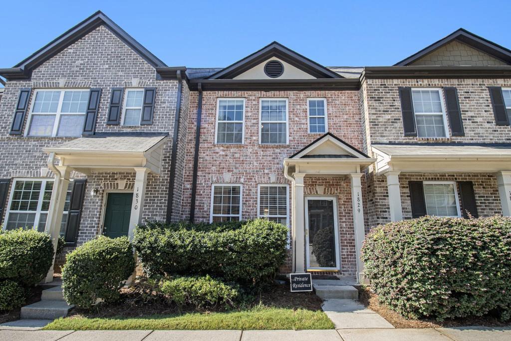 Charming Townhome in the Villages of East Point with Excellent Amenities and Location! Welcome to this stylish Ready Townhome nestled in the friendly and well-maintained Villages of East Point offering Low HOA Fees and a prime location just minutes from Downtown Atlanta, the Westside BeltLine, and Hartsfield-Jackson International Airport. With quick access to I-75/85, I-20, and MARTA, commuting is effortless. Inside, the Main Level offers a thoughtful layout featuring a separate Dining Room, a central Kitchen with Stainless Steel Appliances, Tile Backsplash, and generous Cabinet and Counter Space, plus a Fireside Family Room that opens to a Private Patio perfect for outdoor relaxation. A convenient Half Bathroom rounds out the main floor. Upstairs, the Primary Bedroom boasts a Walk-In Closet and a Private Ensuite Bathroom with a spacious Tiled Shower. Two additional Bedrooms share a well-appointed Hall Bathroom with a tiled tub/shower combo, providing space and comfort for guests or family. Enjoy the added peace of mind with recent updates including a New Roof, Water Heater, Washer/Dryer, and Dishwasher all installed in 2023. As a resident, you'll have access to fantastic Community Amenities including a Pool, Playground, Clubhouse, and Picnic Area. Enjoy easy living with modern comforts, community perks, and unbeatable access to everything Atlanta has to offer.