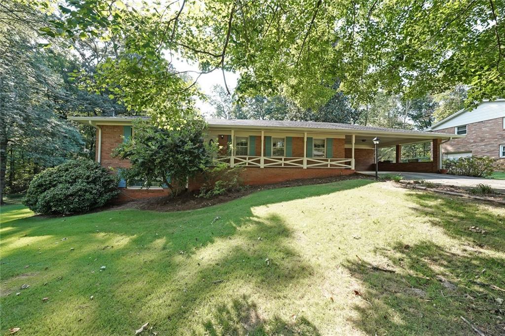 Move-in ready, 4-sided brick ranch with 3 bedrooms, 2 baths, and a full basement with a finished room. Enjoy a screened back porch, fenced yard, new luxury vinyl tile, fresh paint, and updated kitchen countertops and sink. Large 1 acre double corner lot. Great location near all needed amenities.