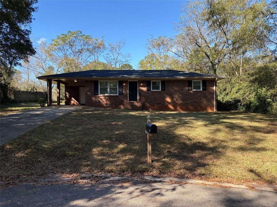 Discover this updated single-story brick home offering approximately 1,032 sq ft of living space on a generous 9,583 sq ft(0.22-acre) lot in Monroe's welcoming Maple Heights neighborhood. The residence features 3 bedrooms and 1.5 bathrooms, with gleaming hardwood flooring throughout the living areas and a bright white kitchen completed by modern appliances and ample cabinet storage. The open living/dining zone flows to a covered carport and a fenced backyard - the perfect space for weekend barbecues or quiet evenings at home. Located just minutes from local boutiques and eateries downtown, easy access to major roads and within reach of parks and recreation, this home places you a short drive from the scenic lake-area and community gatherings.    With nearby shopping and the town's historic charm, this property offers both convenience and character. Don't miss your opportunity to own in this friendly, centrally located community.