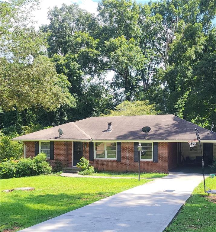 Nice all brick, three bedroom, one bathroom with vintage tile home nested in Decatur. Livingroom, dining room combo, laundry room off from kitchen. This home has lots of potential, partial unfinish basement, two rooms sheetrock and has been waterproofed. Great opportunity for two family home or possible basement rental income. The basement has an entry from the inside of the home and separate entrance from exterior of home. Huge wooded backyard. Do not disturb the occupants of home. Show by appointment only.