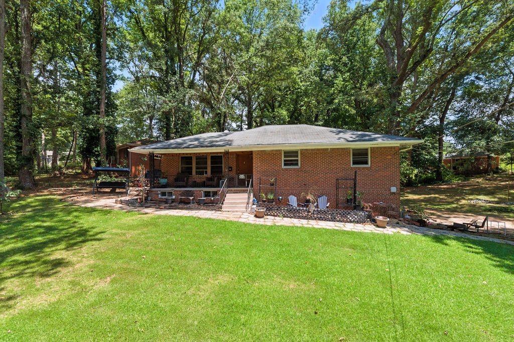 All-Brick Corner Lot Home on Over Half an Acre, offers Endless Potential. Sitting proudly on a corner lot spanning over half an acre, this all-brick beauty offers incredible potential for the right buyer. Whether you’re a homeowner ready to add your personal touch or an investor looking for income opportunities, this property is a rare find. The finished basement opens up exciting possibilities—add a kitchen and transform it into a private rental unit or Airbnb space, allowing the income to help cover your mortgage. Inside, you’ll find hardwood floors, a bright eat-in kitchen, spacious bedrooms, and plenty of room for a growing family. The one-car garage adds convenience, while the expansive layout provides flexibility for a variety of uses. Located within walking distance to a brand-new mixed-use development featuring retail, sidewalks, green space, and more, this home is positioned perfectly for future value and lifestyle convenience.
With enough space for your large family and the potential to generate steady rental income, this property is an exceptional opportunity you won’t want to miss. Schedule your showing today!