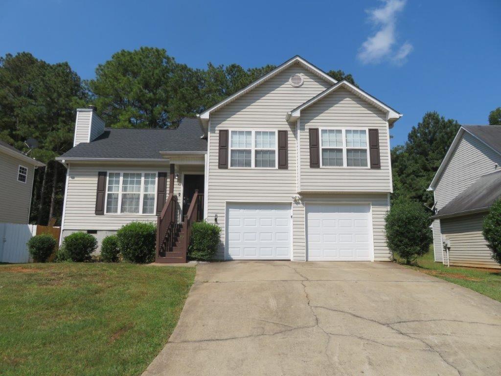 Beautiful, split level home in Barbara Heights! Covered front stoop! Spacious living room with vaulted ceiling and fireplace! Separate dining room! Kitchen features stained cabinets and black/SS appliances! Primary bedroom features deep tray ceiling, walk-in closet, and private bathroom with double vanity, garden tub, and separate shower! Two spacious secondary bedrooms share another full bathroom! Finished bonus room on lower/garage level! Rear deck overlooks backyard! A must see! Don't miss out!