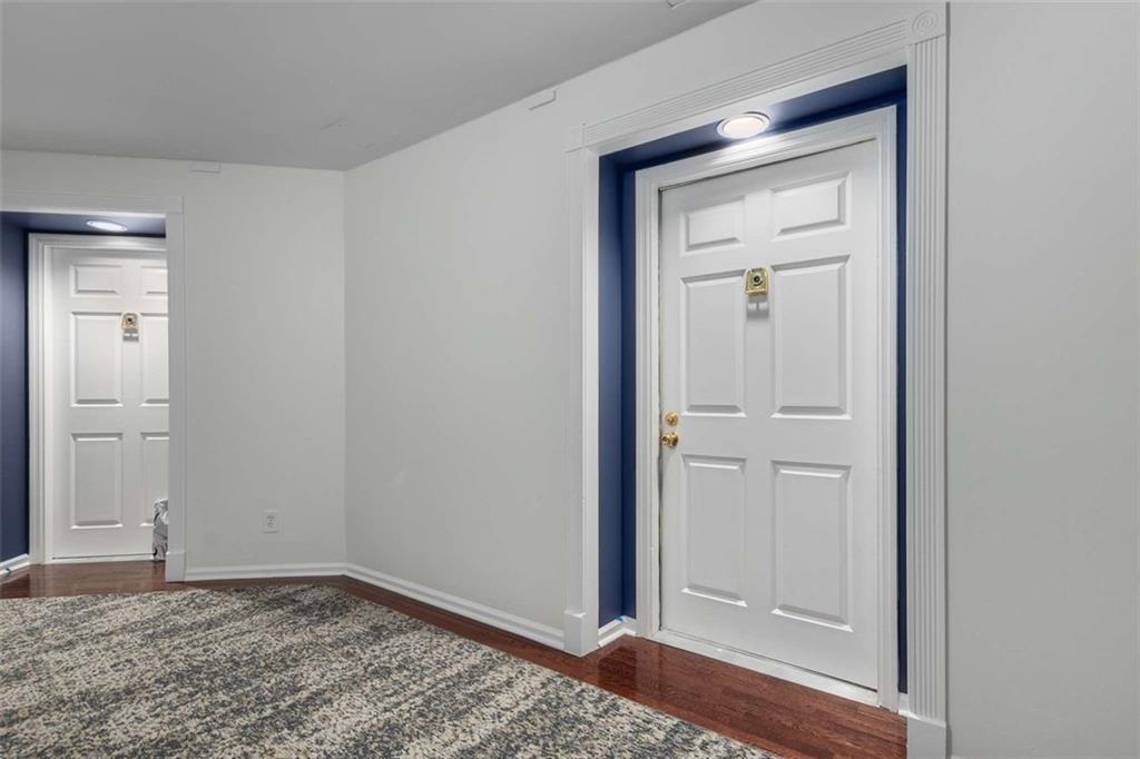 End unit 1st floor condominium nestled in the heart of Midtown Atlanta, just steps from Piedmont Park, this 912 sq ft one-bedroom condo at Colony Park Citi Homes II offers a rare blend of space, amenities, and location. This spacious unit features an open floor plan and a gas fireplace that adds cozy charm to the bright living area. Although in need of some aesthetic updates, the kitchen is central in the unit offering the ability to cook and entertain your guests without being isolated. A bonus den provides flexible space for a home office or guest room. There is even a powder room off the entry hall if this are is used for guest quarters. The bedroom includes a large walk-in closet with a modern shelving system, and the unique split bathroom design offers both a primary bath with tub/shower and a powder room. Residents enjoy access to amenities like a pool, fitness center, clubhouse, and secure gated parking, all within walking distance to the Piedmont Park, the Atlanta Beltline, Marta, Colony Square, and Atlanta’s vibrant cultural scene.
Don’t miss this rare opportunity to make this large, perfectly located condo your own! Call today for a tour.