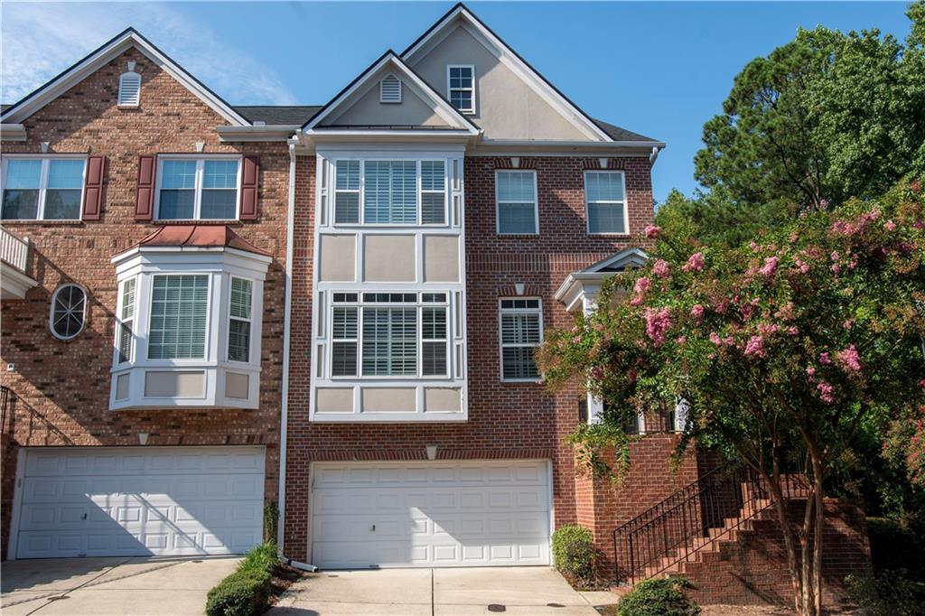 Now available for lease, this stylish and spacious end-unit townhome offering three bedrooms, each with its own ensuite bathroom, plus a convenient powder room on the main level. The home features a bright white kitchen with new appliances, modern light fixtures, and elegant plantation shutters throughout. Enjoy a private balcony for relaxing and an EV charger already installed in the garage. Washer and dryer are included for added ease.
Ideally located just steps from the Silver Comet Trail and minutes from top dining, shopping, and major interstates, this thoughtfully updated home combines comfort, convenience, and modern living in one of the most desirable areas of Vinings. Inquire today!