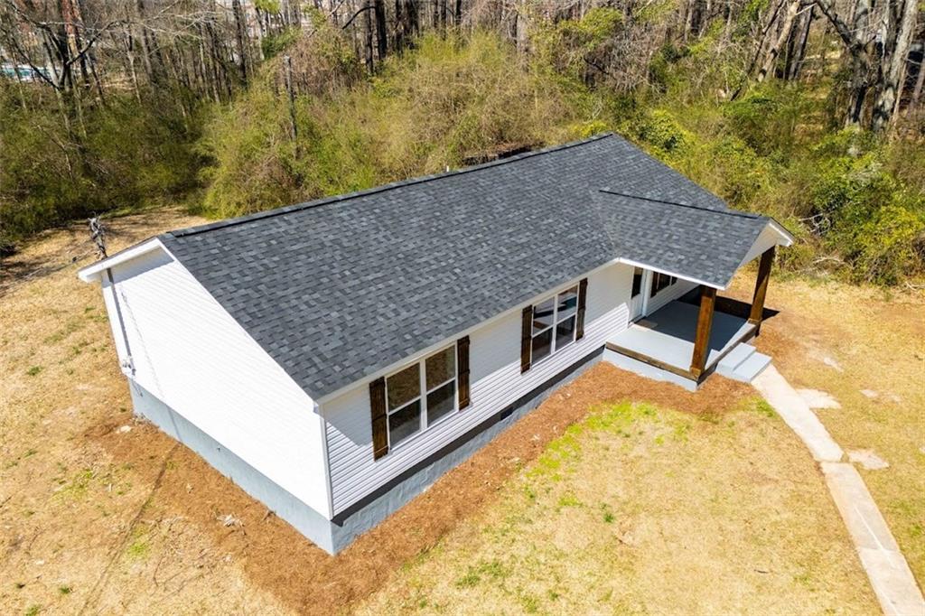 You will love this adorable 3-bedroom 2-bath home situated on a partially wooded lot. It has been updated with lots of new finishes, including cabinets with granite countertops, flooring, fixtures, windows, vinyl siding, a deck, plus more. Convenient to UWG. Don't miss this one, schedule your appointment today!