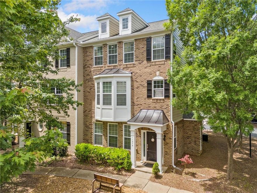 Beautifully updated 3-bedroom, 3.5-bath end-unit townhome in the desirable Westside Villas community in Alpharetta. This bright and spacious corner home features brand new luxury vinyl plank (LVP) flooring on the main level, including the living room, dining area, and kitchen. Plush new carpet adds comfort to all bedrooms and stairways, while LVP continues in all bathrooms, the laundry room, foyer, and hallways for a clean, modern finish.

The kitchen is outfitted with sleek LG ThinQ smart appliances, combining style and functionality. Just off the main level, enjoy a private deck, perfect for morning coffee or evening entertaining.

Upstairs, you’ll find three generously sized bedrooms—each with its own bath—including a serene primary suite. The finished terrace level includes a full bath and a flexible bonus room, ideal for a home office, guest space, or media room (not counted as a bedroom).

Located just minutes from Avalon, Downtown Alpharetta, and Alpha Loop, you'll enjoy endless dining, shopping, and entertainment options. Spend weekends browsing local boutiques, dining al fresco, or catching live music at Brooke Street Park. Easy access to GA-400 makes commuting a breeze, and top-rated schools are nearby.

This move-in-ready home blends comfort, smart features, and unbeatable location—perfect for modern Alpharetta living.