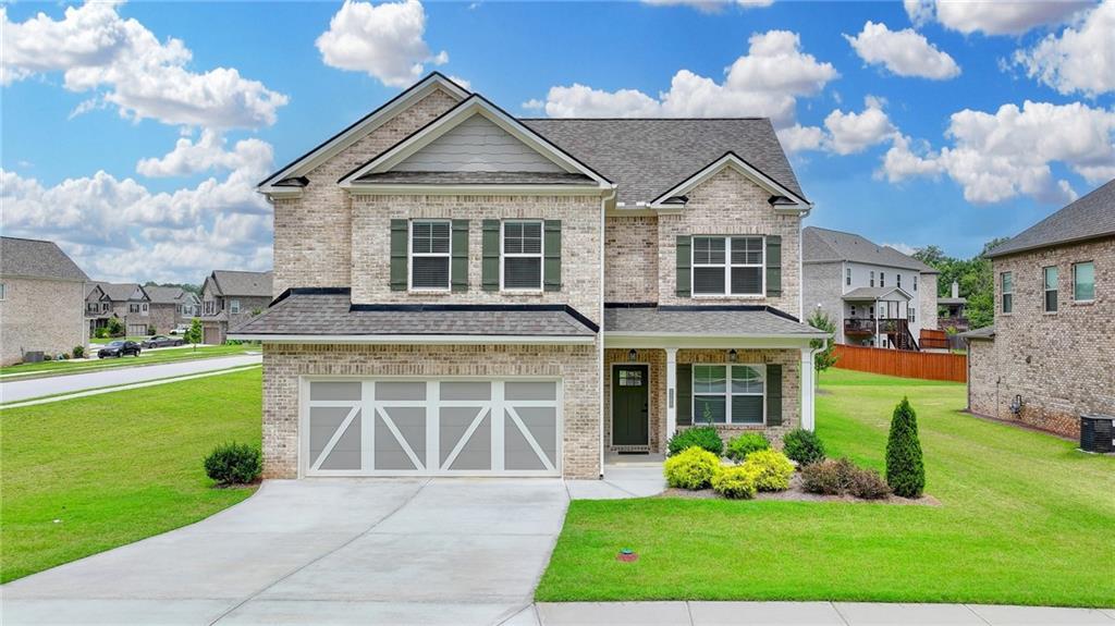 Move-in Ready! Stunning 2021 McMichael Plan by EMC Homes in Buford School District!
This beautifully updated home is move-in ready and boasts fresh exterior paint, professionally pressure-washed exterior, and gorgeous accent walls featuring shiplap and board & batten. Plus, all-new light fixtures throughout—it truly shows like a model!
Inside, you'll find a thoughtfully designed layout with a guest suite on the main floor, an open-concept kitchen featuring 42" cabinets, stainless steel appliances, double ovens, and a huge walk-in pantry.
Enjoy All Top-of-the-line LVP floors throughout, and upstairs you'll find the owner's suite plus two additional bedrooms, two full baths, and a spacious loft.
Situated on a desirable corner lot, this home is an incredible opportunity—don’t miss out!