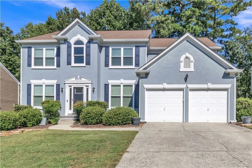 PRICED to SELL - w/ over 20K in Price Reduction... BRING ALL OFFERS!  A must-see in Johns Creek! This spacious 4BR/3.5BA w/ a Full Finished Basement has more to offer than you would imagine.  Home sits at the end of the street, just before a cul-de-sac on a private wooded lot. A two-story foyer opens to a bright, airy family room with a wall of windows and cozy fireplace. Main-level office with French doors, hardwood floors, and fresh neutral paint. Open Concept Kitchen, center island, gas range, walk-in pantry, and plenty of room for entertaining.  It's ready for your personal touch. Oversized primary suite with tray ceiling, garden tub, and separate shower; secondary bedrooms with double vanity bath. The finished terrace level offers natural light, media room, wet bar, sleeping quarters, and full bath.  Perfect for entertaining or multi-generational living. Relax on the oversized deck overlooking the wooded backyard. Swim/tennis community in top-rated Chattahoochee & Findley school district.  A short drive to downtown ATL, Buckhead, Midtown, a Getaway to Lake Lanier or the North Ga Mountains.  You're also Minutes from Emory Hospital, Avalon, Halcyon, Medley at Johns Creek, Big Creek Greenway, parks, shopping, gyms, dining, and much much more