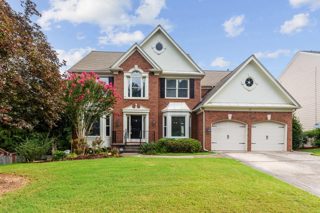 STUNNING 5 BR/3.5 BA Traditional in Dunwoody in a Great School District! This gorgeous home features elegant touches such as hardwood floors, granite countertops, custom shelving, designer paint colors, and more! Grand Foyer entrance with Separate dining room and living room. The Large kitchen open to the family room with a pass-through fireplace to a cozy office. Upstairs is a spacious master with a bright ensuite bath. Three additional bedrooms and full bath. The Terrace level is exceptional with additional living space offering a custom Bar great for entertaining, Media Room, Spacious Recreation/Living Room, Bedroom, and full Bathroom! Enjoy evenings on the back deck. Fenced in back yard and Landscaping maintenance is included! Conveniently located near I-285, 400, shopping, restaurants, and more! Pets allowed, please call for restrictions. **Additional $40.00 per month Resident Benefit Package includes insurance and more!