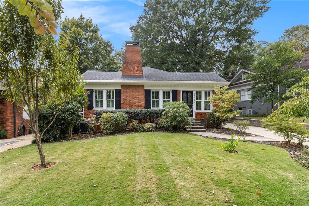 Welcome to a Rare Offering on one of Morningside’s Most Coveted Streets! Lanier Boulevard affords unparalleled proximity to the best of the neighborhood, including effortless access to the Morningside Elementary School campus and the distinctive shops and restaurants of both Morningside Village and Virginia Highland Village.
Set gracefully on a quiet, tree-lined street, this timeless 1930s cottage greets you with a charming sunroom entrance. Inside, historic charm is abundant, with pristine, original hardwood floors flowing throughout. The living room is anchored by a gorgeous, gas-log fireplace, leading seamlessly to the spacious dining room. Culinary excellence awaits in the spectacular kitchen, featuring stone counters, an abundance of cabinetry, and a gas range.
The home offers three finely appointed bedrooms and a versatile bonus room, all benefiting from an elevated sense of comfort and natural light. The primary suite is a true retreat, boasting a generous custom closet and a gorgeous ensuite bathroom. Recent enhancements include new Pella double-pane windows, renovated wiring and lighting systems, and a stylishly updated hall bath shared by the secondary bedrooms.
Outdoors, your private oasis awaits. The lush backyard is dedicated to relaxation, featuring mature gardens, a low-maintenance Astroturf lawn, and a dedicated fire pit—perfect for sophisticated al fresco evenings. Behind the gated driveway, a hard-to-find, renovated two-car garage is discreetly situated.
Don’t miss your chance to call Lanier Boulevard home. Schedule your private showing today!