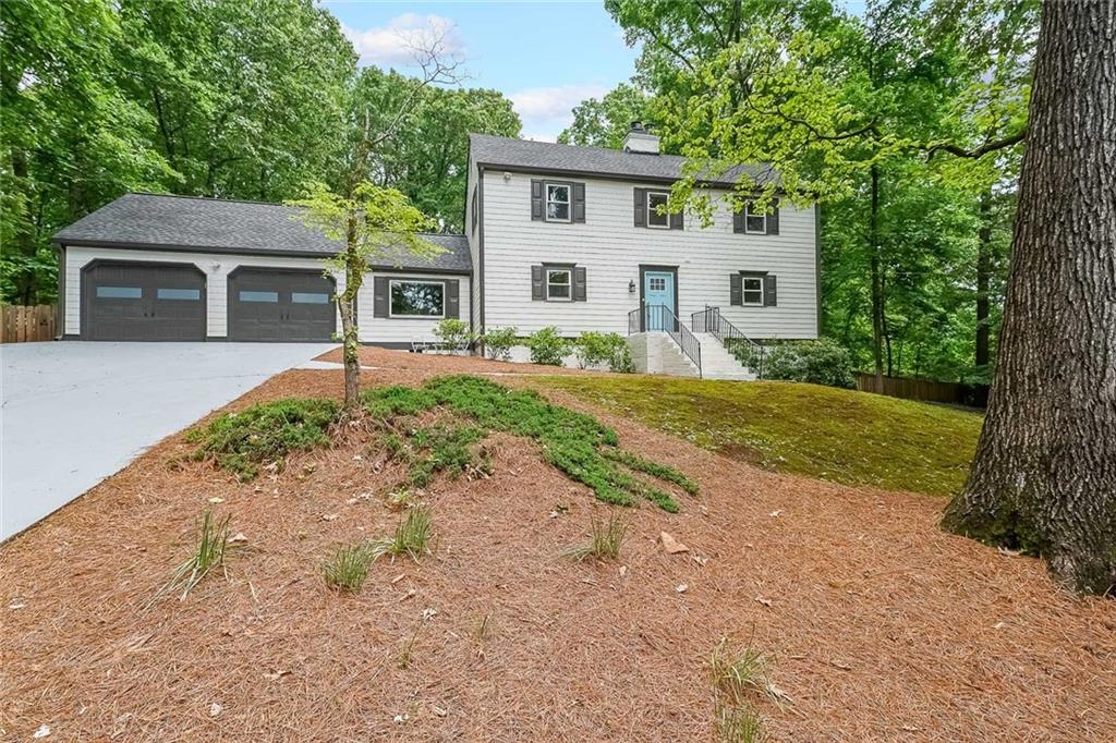 Stunning, fully renovated estate home situated on over two acres, featuring a heated, enclosed private pool. The open-concept layout includes a beautifully updated kitchen, dining area, and living room—all with views of the expansive, wooded front yard and exceptional outdoor living space. The backyard is designed for entertaining, complete with a large sunroom, pergola, and heated pool with waterfalls.
The main-level primary suite offers a renovated bath with a spa-inspired custom stone rainforest shower. Upstairs, both bedrooms include built-in desks and oversized walk-in closets, with a total of six closets providing outstanding storage. The finished daylight terrace level functions perfectly as an in-law or teen suite, featuring a separate entrance, dedicated parking, a full kitchen, and a private bath.
The backyard is fully fenced and thoughtfully landscaped with blackberry bushes and kiwi plantings, and the property offers serene nature trails in both the front and rear yards. Recent upgrades include a newer roof, HVAC system, tankless water heater, renovated kitchen and primary bath, spray foam insulation, security system with cameras, pool heater, and custom window treatments.