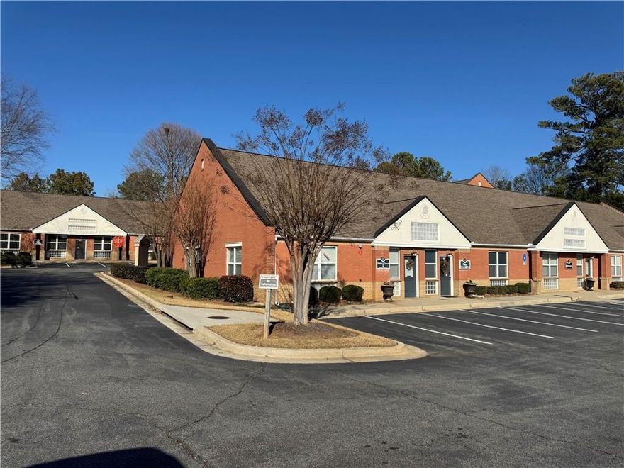 ESTABLISHED PROFESSIONAL OFFICE PARK. THIS UNIT IS A CORNER LOCATION ALL BRICK WITH WINDOWS ON 3 SIDES WITH ROSWELL ROAD VISIBILITY. IT IS LOCATED IN A SHOPPING AREA WITH PUBLIX FOOD, RESTAURANTS, ETC. THIS UNIT IS HIGH END PERFECT FOR ATTORNEYS OR ANY PROFESSIONAL THAT DESIRES AND UPSCALE FINISH. LOTS OF STORAGE IN THE OFFICE OR ATTIC.   PARKING IS NEVER A PROBLEM IN THIS LOCATION. There is a neighboring unit next to this one, which could add an additional 1,400 sqft +/-.