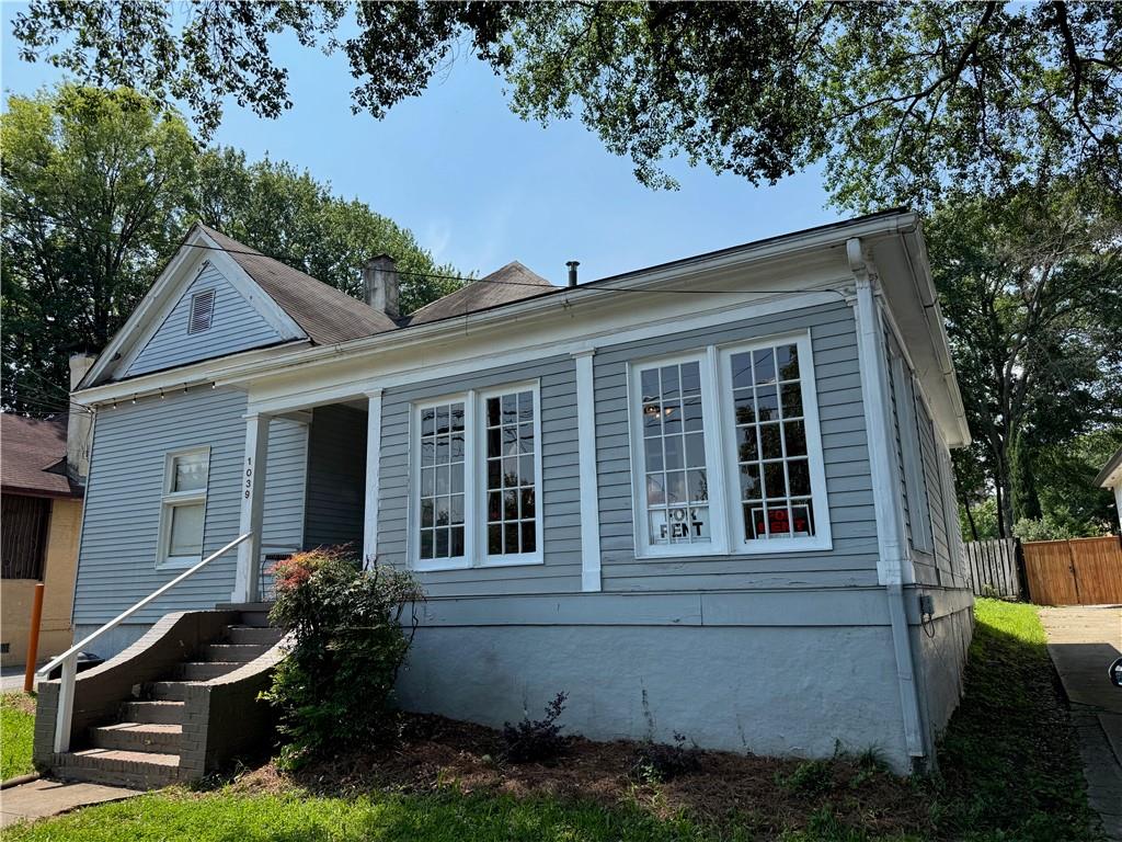 Opportunity to acquire this strategically located RG2 zoned parcel in the heart of Atlanta’s Virginia Highland neighborhood with a duplex in the front and parking lot in the rear. The duplex, originally constructed in 1930, consists of a 1 bedroom and 1 bath unit, as well as a 2 bedroom and 2 bath unit. Each unit has heart pine floors, a full kitchen and washer/dryer hookups. Street parking and stone's throw away from iconic Virginia-Highland bars and restaurants. Duplex is being sold as-is. The parking lot at the back of the property, which includes 21 marked spaces, is part of the sale and is currently leased to a parking lot operator, generating income.