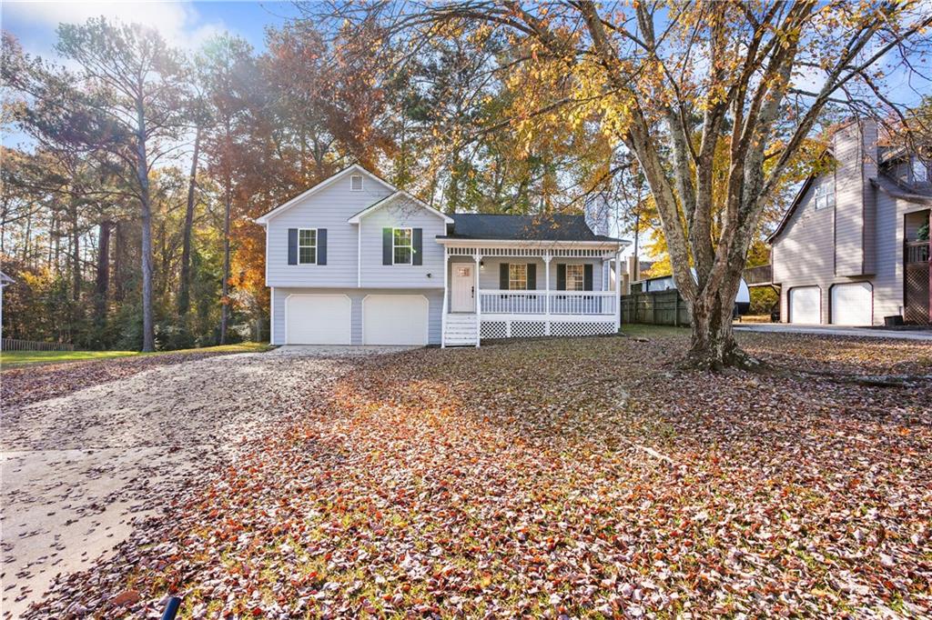 Welcome to 3069 Botany Dr.! This lovely 3 bedroom/2 Bathroom home has so many wonderful features and is impressively priced just under $300K. It is updated, open, and airy with beautiful hardwood floors throughout the first level. It is spacious with ample room for entertaining and hosting. The living room is large with a cozy fireplace perfect for relaxing after a long day. The kitchen is white and sleek with all stainless steel appliances. All the bedrooms are generously-sized, with walk in closets. There is plenty of yard space and a nice deck that overlooks the expansive, tree-lined backyard. Sip your morning coffee on the country front porch and enjoy the tranquility of the Peachtree Place Community. There is also an attached 2 car garage and an extended driveway with plenty of parking. Don't miss this opportunity to be in your new, completely move-in ready, home just in time for the holidays and the New Year. Schedule your exclusive showing today!