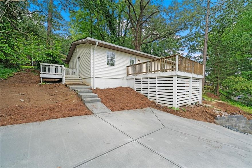 Completely Renovated Gem in the Heart of Downtown Marietta! Welcome to this beautifully updated 3 bedroom, 2 bath home just a short stroll from vibrant Marietta Square. Enjoy the charm of downtown living with the peace of mind that comes from a fully renovated property—featuring a brand new roof, HVAC system, water heater, plumbing, electrical, and more. Step inside to an inviting open-concept floorplan that’s perfect for modern living. The kitchen is the centerpiece, boasting all-new white shaker style cabinets, quartz countertops, stainless steel appliances, and a spacious island that flows seamlessly into the dining and living areas. Durable LVP flooring runs throughout the main living spaces and bedrooms, while both bathrooms showcase stylish tile finishes. The roommate floorplan provides comfort and privacy. Enjoy outdoor living on the brand-new front and side decks—ideal for relaxing or entertaining guests. Showings will begin once the new driveway is complete—don’t miss this opportunity to own a turnkey home in one of Marietta’s most desirable locations!