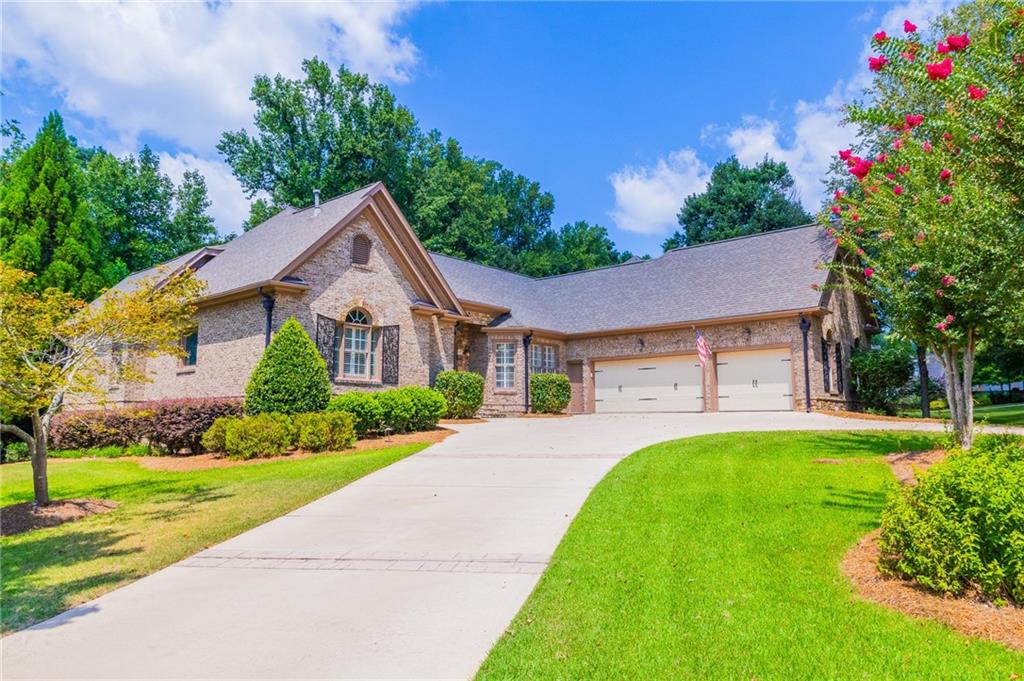 MOTIVATED SELLER. BRING ALL OFFERS. This beautiful TRUE RANCH sits in a quiet cul-de-sac in the Woodland section of Chateau Elan. As you enter you will find a Grand Room, along with a spacious Dining Room. The Kitchen is open to the Breakfast Room and Keeping Room. A beautiful Master on Main along with 2 additional Bedrooms and Bath are also on the main floor. There is an upstairs Bonus Room with half bath - wonderful for Office or flex space. The terrace level is finished with a Bedroom/Bath, Media Rm, Bar/Kitchen area and loads of room for pool table, sitting areas, etc. House is move in ready and this one will not last long!
The neighborhood is adjacent to the Chateau Elan Resort, Spa and Winery. There are 3 golf courses of which one offers private membership, there is also a par 3 golf course. The Resort also has it's own Racquet Club (Tennis and Pickleball), offers numerous events such as cooking classes, wine pairing events and etc. Braselton offers all the conveniences of the metro Atlanta area with all the advantages of a smaller community. Easy access to I85 to Atlanta or Greenville, 985 that connects to Gainesville, Georgia and highway 211 that connects to the University of Georgia in Athens. Chateau Elan is a golf cart friendly neighborhood inside the gates and outside of the gates via the LifePath of Braselton. The Northeast Georgia Medical Center Braselton campus is just 5 minutes away. The Sports Club (Swim/tennis/fitness) is optional for this home.