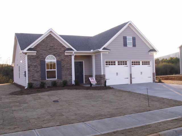 Brand new stepless ranch home with spacious/open plan,features upgraded hardwood floors,vaulted ceiling,9'ceilings,decorative FP,Hardi Plank siding,crown molding,& chair rail,arch.shingles.Great community near shopping,schools,hospital & I-575,pool & playground in community.