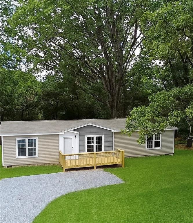 Brand new 3-bedroom, 2.5-bath mobile home nestled on a beautiful 2.01-acre lot in the heart of Northeast Georgia. This mobile home offers modern design and country charm, with an open floor plan, abundant natural light, and large windows that bring the outdoors in.
Step inside to discover a spacious, light-filled layout ideal for entertaining or simply relaxing. The open-concept kitchen and living area make this home feel airy and inviting. With three generously sized bedrooms, including a primary suite with a private bath, there's plenty of room for family and guests.
Outside, enjoy your morning coffee on the front porch or unwind in the evening on the back porch, both offering peaceful views of the surrounding woods and the gentle sounds of nature. The lot extends all the way back to a small creek, adding to the tranquility and appeal of the property.
Located in a quaint, scenic area, this home offers privacy, room to roam, and the comfort of new construction — all just minutes from town conveniences.
