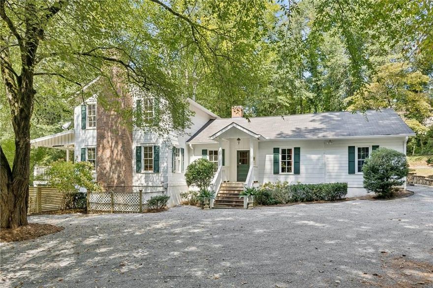 Rare 11-Acre Equestrian Retreat in East Cobb! Welcome to 4019 Wesley Chapel Road — a private estate offering 11 acres of unmatched serenity and possibility. Tucked away in one of East Cobb’s most desirable locations, this former equestrian property is a true hidden gem, blending timeless charm with boundless potential. The residence is filled with character and warmth. A light-filled kitchen anchors the home with custom cabinetry, double ovens, an oversized island with cooktop, and abundant prep space. Multiple gathering rooms, each with inviting natural light and hardwood floors, provide perfect backdrops for both casual living and elegant entertaining. The bathrooms are spacious, offering classic finishes and the opportunity for personalization. Step outside and experience the lifestyle most only dream of. A sparkling pool, framed by a new privacy fence and surrounded by mature woodlands, invites you to unwind in total seclusion. For equestrian lovers, the estate’s heritage is unmistakable. Multiple barns with stalls, fenced paddocks, and turnout areas are thoughtfully laid out across the grounds, ready to be restored to working order. With gently rolling acreage and tree-lined borders, the setting is both functional and breathtakingly beautiful. Here, you’ll find the perfect balance: a private retreat surrounded by nature, yet minutes from top-rated schools, shopping, dining, and major highways. Whether you envision reviving it as a premier horse property, crafting a luxury family compound, or pursuing development opportunities, 4019 Wesley Chapel Road offers a canvas unlike any other.