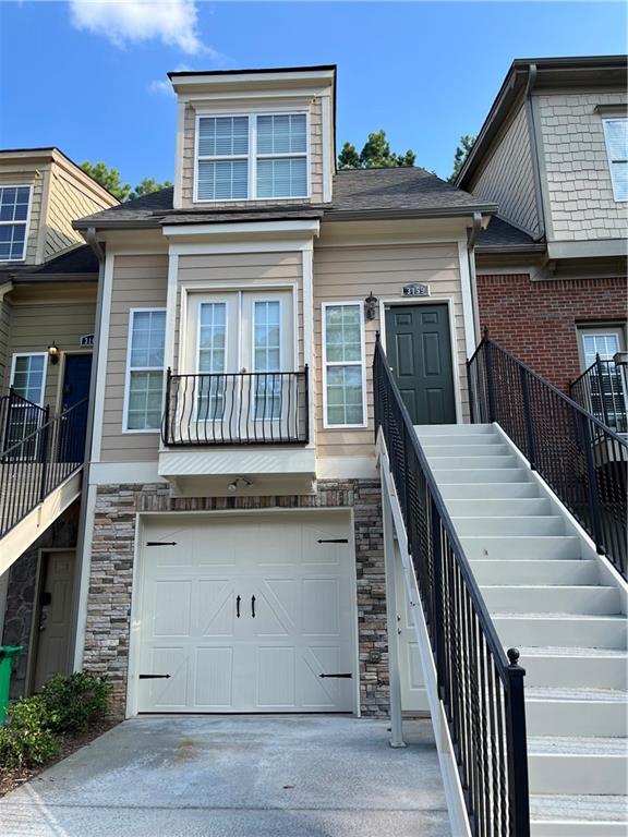 Welcome to this bright and stylish 2-bedroom, 2.5-bath townhome located in the highly sought-after Stonewyck community in Decatur. Just 15 minutes from Downtown Atlanta, this spacious home offers a perfect balance of comfort, functionality, and unbeatable location—ideal for professionals, roommates, or small families. Hardwood floors on the main level. Open concept layout with double-sided fireplace between the living and dining areas. Updated kitchen with stainless steel appliances, gas range, and ample storage. Upstairs primary suite with dual vanities, walk-in closet, and ensuite bath. Private lower-level bedroom suite with full bath and separate entrance—perfect for guests, a roommate, or a home office. In-unit washer and dryer included.
Exterior & Community features boast wooded views and extra natural light. Attached 1-car garage with additional driveway parking. Quiet cul-de-sac in a well-maintained community. HOA covers exterior maintenance and landscaping.
Prime Location
Only 15 minutes to Downtown Atlanta via I-285 or I-20
5 minutes to Downtown Decatur: cafes, restaurants, breweries, and shopping
Minutes to Emory University, CDC, Agnes Scott College, and DeKalb Farmers Market
Close to Toco Hills Shopping Center, North DeKalb Mall, Target, Publix, and more
Easy access to I-285, I-85, and MARTA