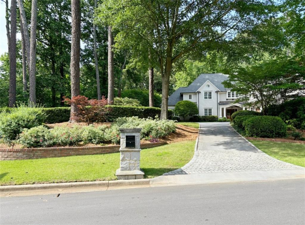 Welcome to your private retreat in the highly sought-after Riverside community of Sandy Springs. This beautifully renovated 1-bedroom, 1-bathroom basement apartment offers 1,000 square feet of modern comfort, charm, and complete privacy. Thoughtfully designed with an open floor plan, the space features brand-new stainless steel appliances, a cozy electric fireplace, a wall-mounted TV, and a stylish walk-in foyer that doubles perfectly as a home office or creative studio. The serene bedroom, highlighted by warm pinewood ceilings, creates a restful atmosphere, while the spacious full bathroom and in-unit washer and dryer provide everyday convenience. Enjoy living just 5 minutes to the vibrant Sandy Springs dining scene, Performing Arts Center, local grocery stores, and only 10 minutes from Perimeter Mall and nightlife. Parks and walking trails are nearby, and Hartsfield-Jackson Airport is a 30-minute drive. With quick access to GA-400 and I-285, commuting is effortless. This private, turn-key apartment in one of Sandy Springs’ most desirable neighborhoods is ready for you to call home.