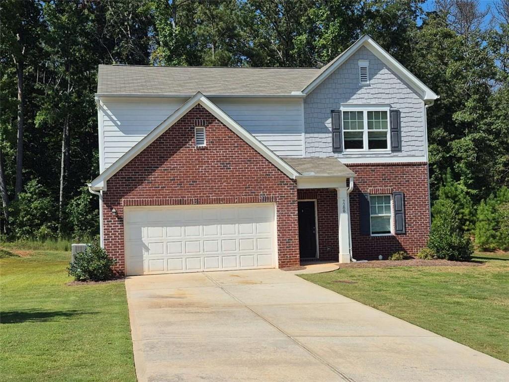 GAMLS supra lockbox on front door, Beautiful 4 Bedroom 2 Full Bathrooms 2 story Home. Very open floor plan with large kitchen over looking the living room. Granite counter-tops and tons of cabinets. Complete stainless steel appliances package. New Paint 2025. Beautiful wooded views...Must See!