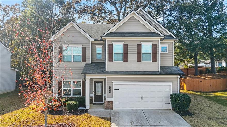 Welcome to your new chapter at 208 Evergreen Way - a beautiful, move-in ready 4-bedroom, 2.5-bath home built in 2019 in vibrant Loganville. Nestled on a quiet, well-maintained lot in a sought-after neighborhood, this residence delivers modern comfort with timeless style.    Step inside to an open-concept great room with a coffered ceiling where light flows seamlessly into the gourmet kitchen - complete with a large island, breakfast bar, and walk-in pantry. The adjacent formal dining area offers the perfect space for gatherings, while casual meals move easily to the breakfast nook.    Upstairs you'll find a spacious primary suite with dual vanities, separate tub and oversized shower, and a generous walk-in closet. Three additional bedrooms and a full hall bath provide plenty of space for family, guests or a home office. A convenient upstairs laundry adds ease to everyday routines.     Outside you'll discover a backyard retreat with a covered patio and fireplace.  Perfect for entertaining or just relaxing at home. Location is key, and this one delivers: highly-regarded schools, nearby shopping and dining, and easy access to Atlanta and beyond.     Whether you're hosting a formal dinner, relaxing with a book in the cozy breakfast nook, or prepping for the week ahead in your enviable owner's suite, this home offers smart design, refined finishes and a lifestyle you'll love coming home to. Don't miss the opportunity to make 208 Evergreen Way your next place to call home.