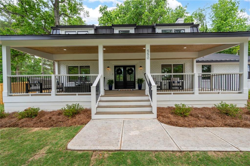 Welcome Home to this Marietta Beauty! Completely renovated modern Farmhouse in HISTORIC MARIETTA. Walkable to the Marietta Square or Kennesaw Mountain trails. This home has been transformed into a Dream Home with WELL OVER $250K IN RENOVATIONS & UPGRADES, showcasing an updated floor plan & updated style to make it the perfect living space. It is gorgeous! LARGE Premium CORNER lot with beautiful hardwood trees. Relax & enjoy the viewpoint from the perfect elevation while sitting comfortably on the spacious covered FRONT PORCH. Southern Charm at its finest! Beautiful Hardwood flooring throughout. The main floor consist of - Family Room w/gas log fireplace & view to Kitchen, Formal Living Room, Dining Room, Large Gourmet Kitchen w Stainless Steel, Quartz, Island w pop-up outlet, soft close cabinet drawers & doors, backsplash, two pantries, Laundry Room, a half bath & lots of storage. Upstairs you'll find Two Primary Bedroom Suites, a Secondary Bedroom, & an Office (there are 3 gorgeous full baths upstairs). Home features NEW 40-YEAR WARRANTY METAL ROOFING SYSTEM, two new LENNOX HVAC systems & ductwork, new hot water heater, new doors & windows, new lighting, custom closets, insulated attic and encapsulated crawl space, and so much more. This is not a typical flip. Sellers intended for it to be their longtime home, they lovingly and thoughtfully renovated the home inside and out. Fenced backyard is huge & perfect for entertaining, it features a DELUXE PRIVACY FENCE, patio, & outdoor storage building for tools. New Driveway & new walkways. Perfectly located in a Prime location between Kennesaw Mountain & Marietta Square, with trails, shopping, restaurants and EVERYTHING YOU NEED FOR LIVING A VIBRANT MARIETTA LIFESTYLE! Highly sought after schools including West Side Elementary.