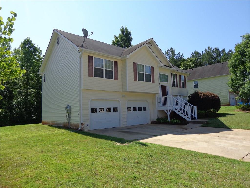 3BR/2BA Two-Story Home in Established Quiet Country Neighborhood. Vaulted Great Room with Rock Fireplace. Nice Oak cabinets in the Kitchen with Full Appliance Package. Laundry on Main, Large Rear Deck with Backyard Step Access. Master BR features Tray Ceiling, Walk-In Closet and Master BA Features Garden Tub & Separate Shower. NEW Paint, NEW Carpet, Blinds Throughout, VERY Clean and Well Maintained. 2 Car Garage and Large Deck Includes Private Wooded View. MOVE-IN READY. Hurry, This One Won't Last!