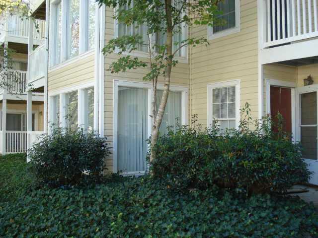 LOCATED IN THE REAR OF COMPLEX, THIS UNIT IS A GREAT BUY! FRESH PAINT, NEW CUSTOM TILE FLOOR,UPDATED BATHS; BUILT-IN BOOKCASES AND ALL APPLIANCES STAY. PRIME LOCATION, ONLY MINUTES TO 75/285. CLOSE TO SHOPPING, RESTAURANTS, UNIVERSITIES. WHY RENT WHEN YOU CAN OWN!