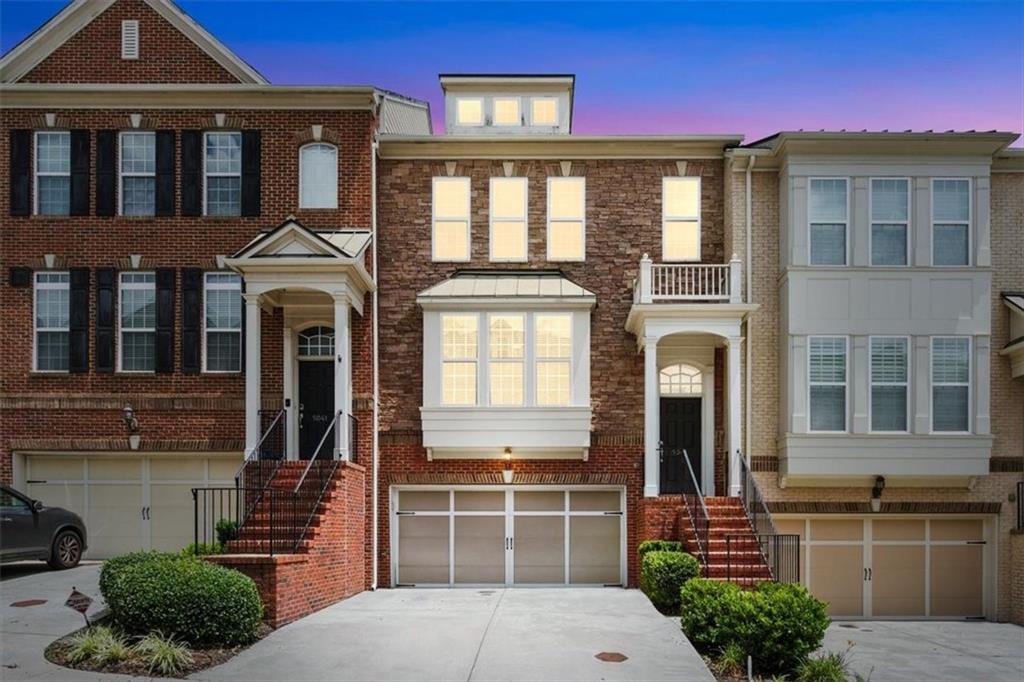Location is KEY—Atlanta address with low Cobb Co taxes. This stunning 4-bedroom, 3-1/2-bath townhouse features designer lighting and a smart home system, including a Ring video doorbell, smart door lock, smart light switches, smart garage, and pre-wiring for electric vehicle charging! This spacious townhouse boasts hardwood floors, a beautiful kitchen with granite countertops and stainless steel appliances overlooking a private back deck. The oversized master bedroom includes a master bath with double vanities. Lower level is perfect for a roommate or teen offering a private bed & bathroom and patio! Located minutes from Midtown, Downtown, Truist Park, shopping, and the Chattahoochee River Trail or Airport! Low HOA covers water, sewer, trash, lawn care, pool, dog park, and termite bond—spacious two-car garage with storage. Don’t wait—this 4-bedroom won’t last long.