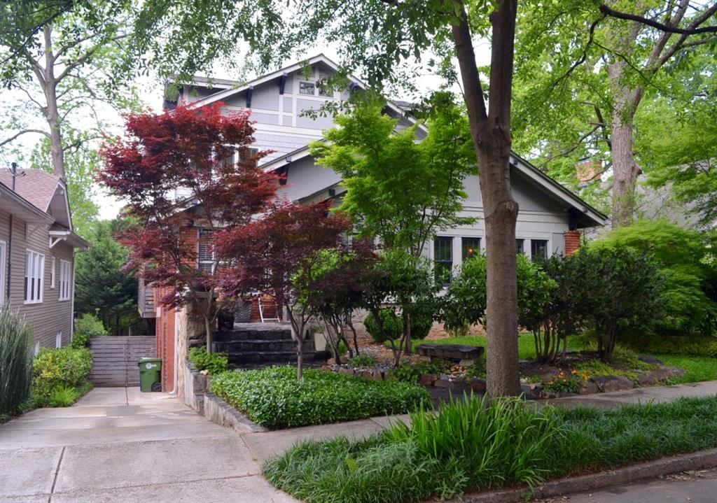 LOCATION, LOCATION, LOCATION! Doesn’t get better than this! Quiet side street steps from bustling Virginia-Highland village. Spacious renovated Craftsman home w/ hardwood floors and so much character, 10’+ ceilings & unique fixtures and architectural touches throughout. Kitchen boasts high end SS appliances, including Wolf range. Main floor has two living areas, formal dining room, south-facing sunroom, as well as large deck off back living room. Large Master’s suite features a true spa-like bath, walk-in closet & laundry closet. 3-BR/2-BA upstairs, 2-BR/1-BA on main level. Top-notch and highly sought after school district and walkable to so much in every direction!
