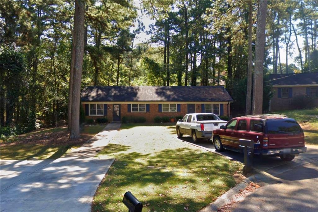 Duplex Opportunity in Prime Lawrenceville Location! Perfectly positioned just minutes from The Shoppes at Webb Gin and all the dining and retail Scenic Hwy has to offer. This all-brick duplex is a rare find. Each unit features 2 spacious bedrooms and 1 full bathroom, including private primary suites and generously sized secondary bedrooms. The bright, open floor plans offer large living rooms ideal for entertaining, plus kitchens with ample cabinet space. Step out onto the back decks and enjoy the peaceful backyard setting. Whether you're looking to live on one side and rent the other, house multiple generations, or add a solid income-producing asset to your portfolio, this property checks all the boxes! Don’t miss this rare opportunity to own a duplex in a thriving, high-demand area of Lawrenceville! Contact Rae Johnson with eXp Realty for additional information.