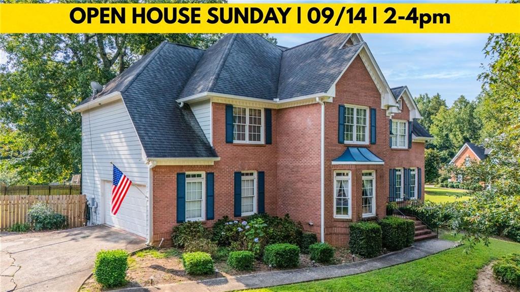 *** For Video Tour: Type this into YouTube: Perfect Family Home | Flowery Branch High School District | Buford, GA *** Welcome to this beautiful home located in the highly desirable Morgan’s Crossing neighborhood of Buford, GA. Perfectly positioned on the Hall County side, homeowners here enjoy lower property taxes while still benefiting from the unbeatable Buford location. Morgan’s Crossing offers the best of both worlds—peaceful suburban living with easy access to shopping, dining, Lake Lanier, top-rated schools, and major highways for commuters. Sitting on a corner lot, this property offers exceptional parking with not only a traditional driveway but also an additional drive that leads to a garage underneath the home—large enough to once hold a 12-foot pontoon boat. Inside, the main level welcomes you with a flexible room to the right of the entry, perfect as an office, playroom, formal living room, or game room. To the left, a formal dining room with a bay window flows into a coffee bar and half bath. The open kitchen is the heart of the home, offering abundant countertop and cabinet space, stainless steel appliances, and room for a large island. Positioned to overlook the backyard, the kitchen makes it easy to keep an eye on kids while cooking. Just off the kitchen are both the laundry room with extra storage and the spacious living room that easily accommodates a large sectional. Upstairs, you’ll find five generously sized bedrooms. Each offers ample closet space, while a double vanity full bath serves the secondary rooms. The master suite stands out with tray ceilings, a sitting area, and walk-in closets. The master bathroom features dual vanities, a soaking tub, and a separate walk-in shower. The finished basement expands the possibilities of this home. With its own garage, driveway, and private entry, it’s an ideal setup for a mother-in-law suite, older teenager, or extended family. The basement also includes a large office (which could easily be converted to another space for sleeping with the addition of double doors), a renovated full bath, a storage room, and flexible living space. Off the living room, enjoy a bright four-season sunroom that leads to an uncovered back deck, perfect for grilling or hosting with a smoker. A few steps down, the backyard opens up into a massive, flat, fenced-in yard—a child’s dream play space with plenty of room to add a pool if desired. With its versatile layout, extra parking, and unbeatable location in Morgan’s Crossing, this home truly offers something for everyone.