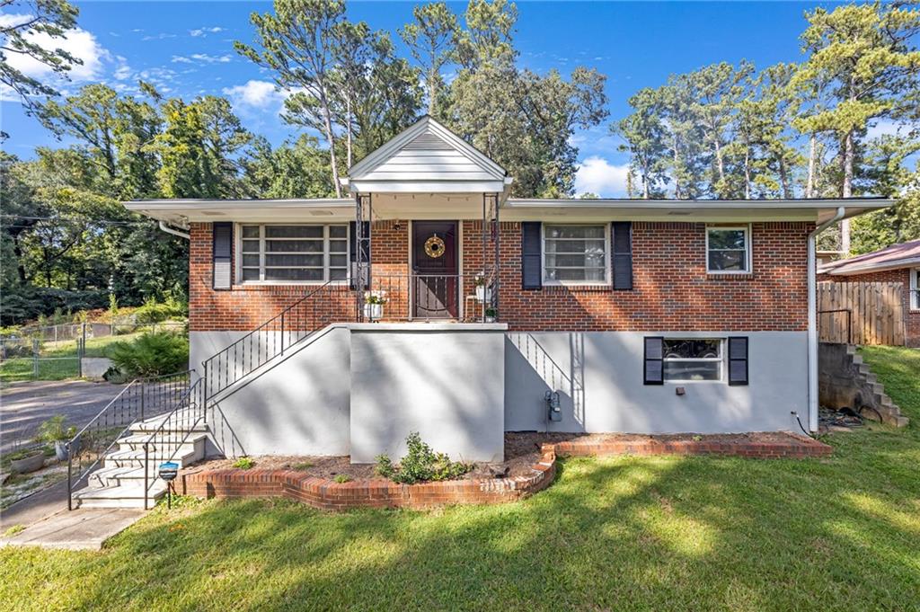 Check out this cute and cozy 2-bedroom, 1-bath home that is full of potential! Perfect for first-time buyers or investors! Located in the heart of Atlanta, this property features a super spacious front yard and a basement garage with plenty of storage or workshop space! The bones are good! Solid structure, ready for your personal touch – sold as-is! The seller is motivated - bring all offers! Whether you're looking to buy your first home or invest in a growing area, this is a great opportunity to own property in Atlanta. Don't miss out!