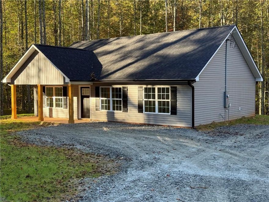 Sellers are willing to offer a $5000 credit towards closing costs OR rate buydown with acceptable offer. Welcome to your new home in the heart of Dahlonega, Georgia - a fresh 3 bedroom 2 bathroom new construction home blending convenience, low-maintenance living, and no HOA. This home features locally crafted custom cabinets, stainless appliances, granite countertops, and LVP flooring. Nestled in  Dahlonega's vibrant community. Enjoy ultimate convenience with downtown Dahlonega just minutes away - featuring boutique shops, award-winning wineries, historic sites, and farm-to-table dining. Commuting is a breeze with easy access to Highway 400, connecting you swiftly to Atlanta's opportunities.