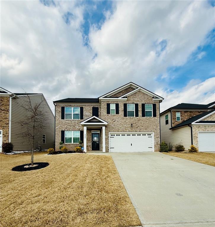 Welcome to this stunning home in the desirable Summerwind Subdivision in Dacula, GA. This newer subdivision offers convenience and shopping just minutes away. As you enter, you'll be greeted by an open and inviting foyer leading to a formal dining room. The bright and open kitchen overlooks the family room with an updated fireplace, perfect for cozy nights in. Enjoy the sunroom off the kitchen, or step outside to the private fenced backyard with a deck, offering a beautiful view. With a bedroom on the main level and a full bath, On the upper level the Owner's suite featuring a private bath and walk-in closet, this home has everything you need. The great sized secondary rooms and open loft area provide plenty of space for everyone. Upgrades throughout the home, including flooring, lighting, shelving and fixtures, add a touch of elegance. The backyard is enclosed with a privacy fence, creating the perfect space for relaxation and outdoor gatherings. With entertainment venues and shopping centers nearby, you'll have plenty of options for dining and leisure activities. Don't miss out on this perfect blend of comfort and modern living in a prime location. $15 monthly technology charge. PETS NEGOTIABLE